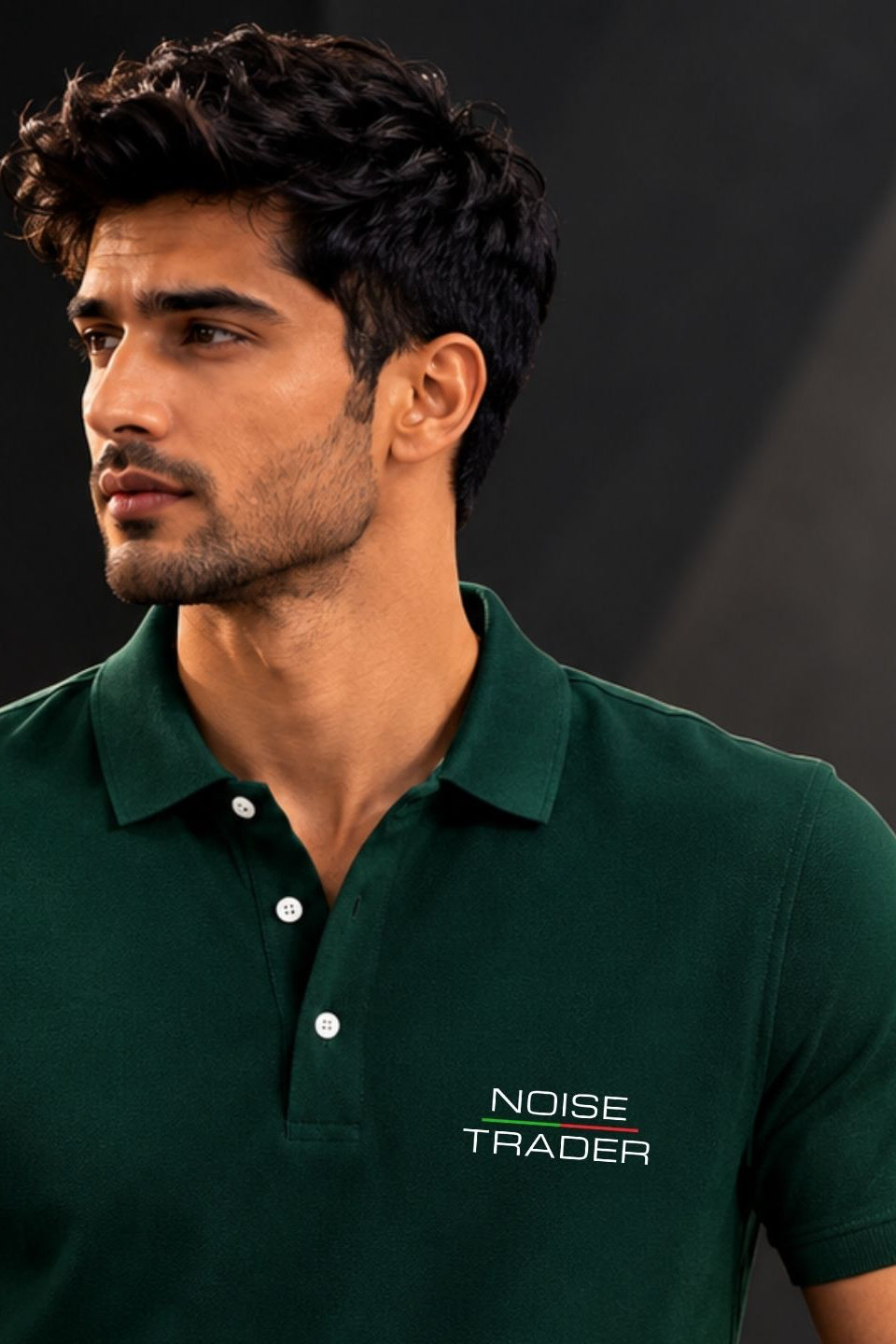 Man wearing a green polo shirt with 'Noise Trader' logo against a dark background