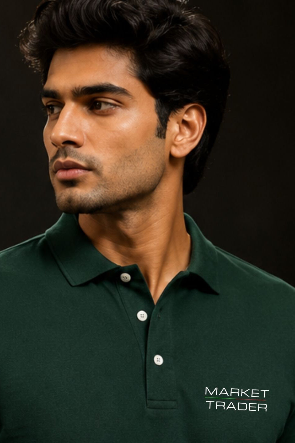 Man wearing a dark green polo shirt with 'Market Trader' logo on a black background